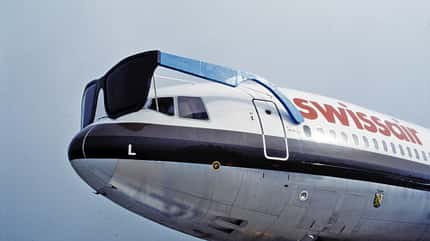 Bug der McDonnell Douglas DC-10-30 ER, HB-IHL "Ticino" mit überdimensionierter Sonnenbrille auf dem Eröffnungsflug in Los Angeles